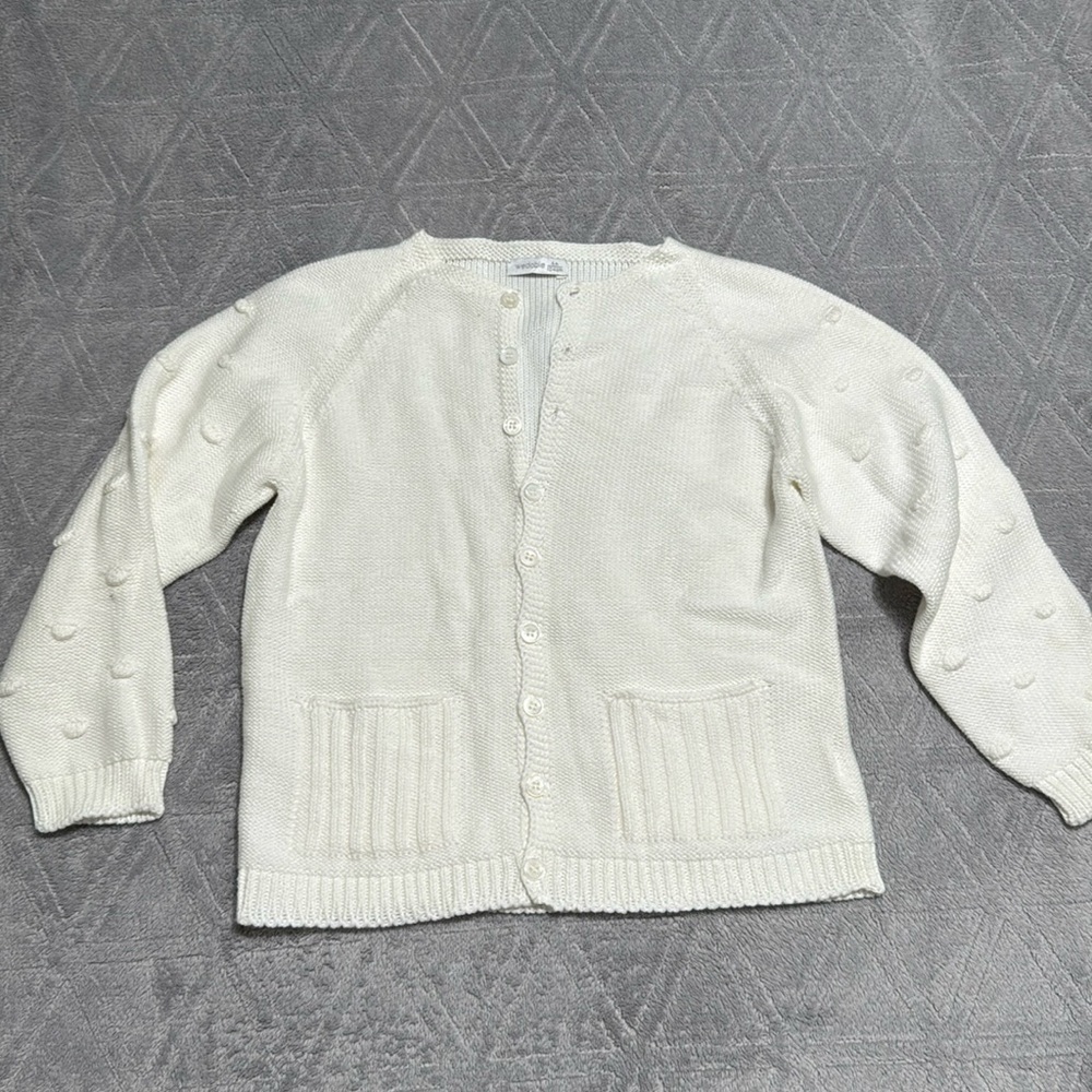 White knitted cartigan with Pom Pom sleeves